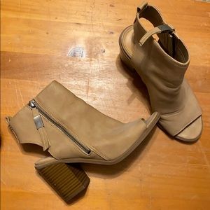 Tan open toed pumps
